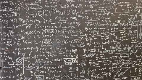 Stock image of a blackboard with equations