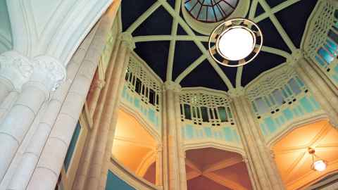 Building detail of ornate ClockTower ceiling from below.